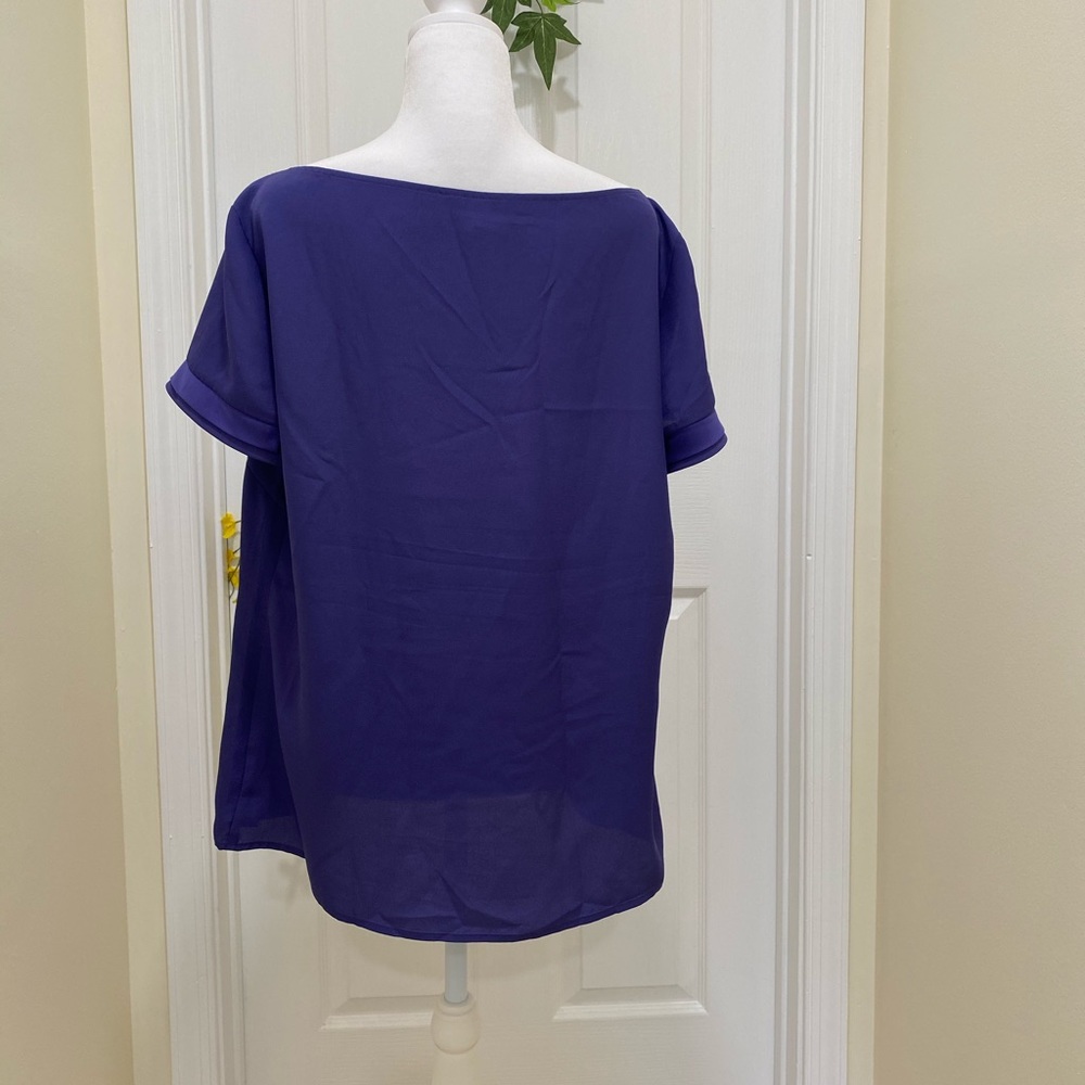 Gentle worn once vibrant color purple